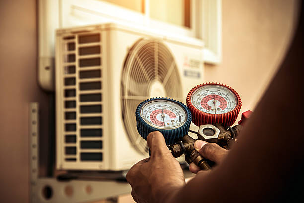 Professional Heat Pump Repair technician working in Fowlerton, IN